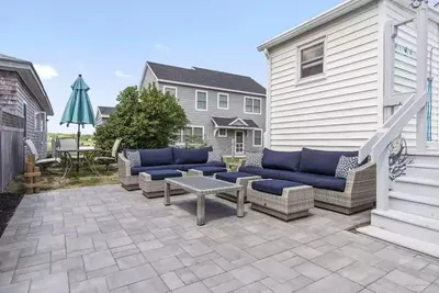 Image de Quatre charmante Chambre Maison Overlook Wells marais salé de l'eau.