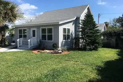Image de Cottage en bois flotté au bord de la mer