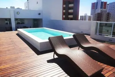 Image de Appartement 2 chambres à Tambau avec piscine sur le toit