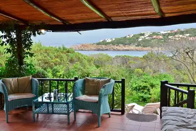 Image de Villino sur l'eau, à 30 mètres à pied de la mer, jardin privé, parking, wifi