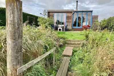 Image de 4pers - Maison avec sauna, jardin d'hiver et quai de pĂŞche devant le Lauwersmeer
