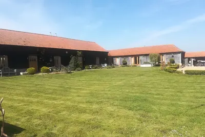 Image de La grange à foin. 3 chambres avec salle de bains, poêle à bois, bain à remous en option.