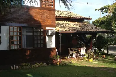 Image de Maison confortable dans copropriété arborée avec piscine, sauna à 100 mètres de la plage
