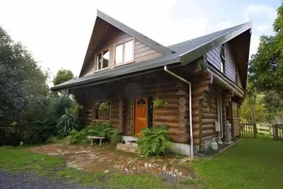 Image de Log Cabin exceptionnel dans un superbe naturel Lieu