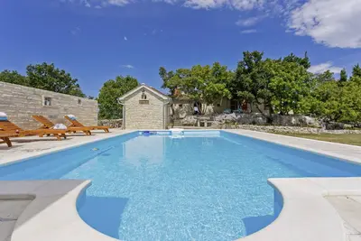 Image de Maslina à Popovići (maison pour 5-7 personnes)