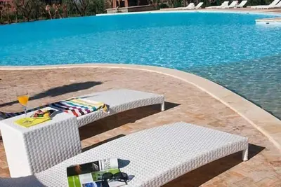 luxueux Appart-Hôtel à la Palmeraie avec son propore jardin privatif + Piscine à un pas de votre appart + Fitness + Teniss