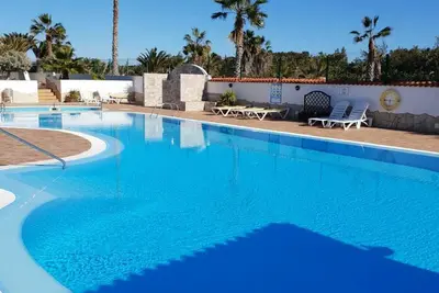 Bungalow bien équipé avec vue sur la mer, à quelques mètres de la plage