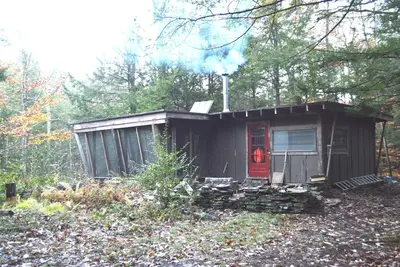 Image de Wilderness Waterfront Cabin sur la rivière --- Extrêmement privée et hors de la grille