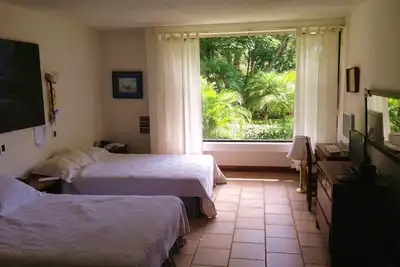Image de Appartement de jardin dans un condominium très exclusif avec d'excellents équipements!