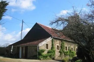 Image de Corps  de  ferme  breton  soigneusement   rénové  avec  goût dans un cadre sup.