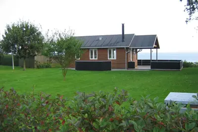 Image de Bien que la maison de 37m2 dans la première rangée avec vue panoramique sur le fjord.