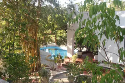 Image de Bungalow confortable avec piscine privée et cuisinier
