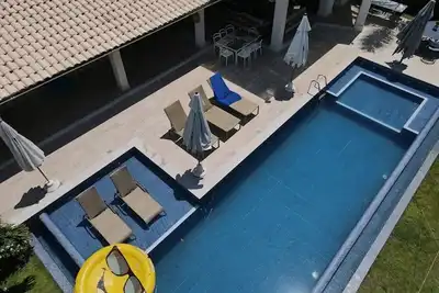 Image de Maison confortable au bord de l'océan à Guarajuba 5/4. 20 lits. Contactez nous!