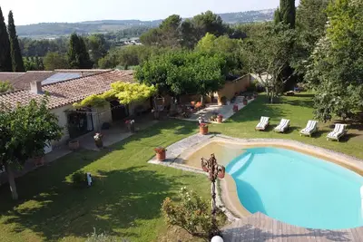 Image de Maison Climatisée ds. les Prés, Piscine jardin 1Ha. arboré potager bio à 8 mn Aix