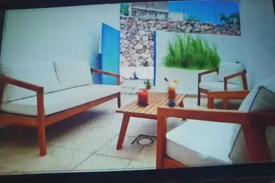 Image de Maison de village de style bord de mer au calme avec terrasse couverte et clim