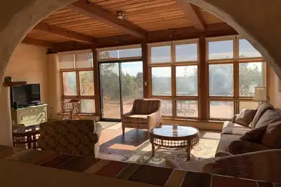 Image de Classic Passive Solar Adobe home. Cuisine récemment rénovée.