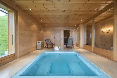 Image de Chalet suisse de luxe avec une vue exceptionnelle, situé à 50 mètres de la piste