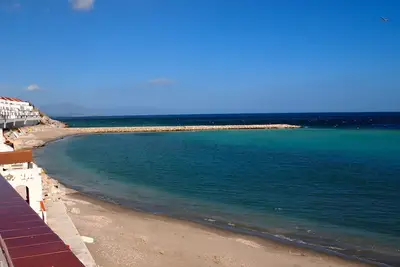 Image de Détente Bien Nommé Beachside Appartement