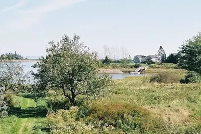 Image de Unplugged! écrans numériques commerciaux pour les vues d'écran porche de crique, prairie et de la mer