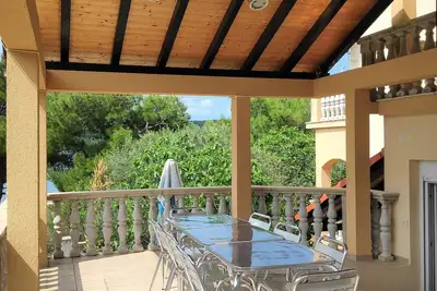 Image de Sur la plage de Crna Punta - l'endroit idéal pour des vacances en famille à Zadar