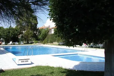 Image de Bungalow (1er étage) avec piscine - tout confort pour 4 personnes avec parking