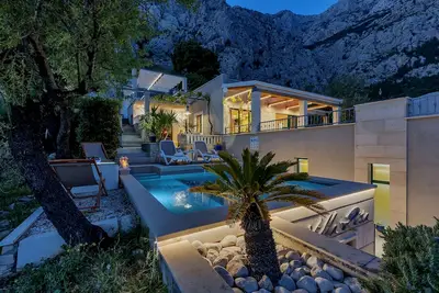 Image de Maison avec piscine chauffée, terrasse, vue mer, mini golf u. Aire de jeu pour enfants