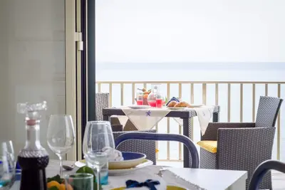 Image de Appartement de plage avec terrasse, vue sur la mer, quartier calme, WiFi, max. 5 personnes