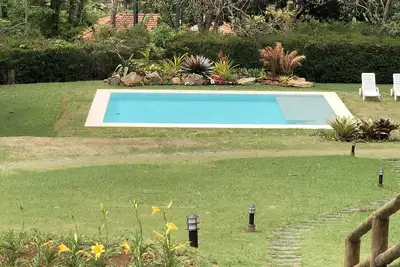 Image de Maison avec 5 suites, piscine et barbecue, à 250m du centre de Vale das Videiras