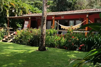 Image de Maison pied dans le sable sur la plage de miroir