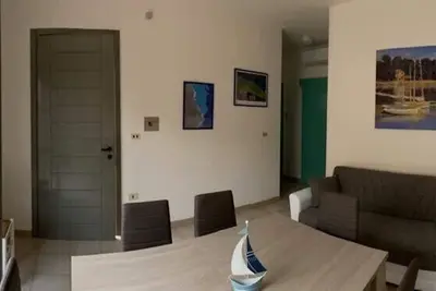 Image de Appartement à Torre dell'Orso avec jardin et garage à 300 mètres de la plage.