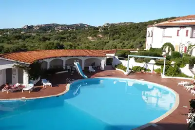 Image de Grand et confortable appartement de trois pièces dans une résidence avec piscine, Costa Smeralda
