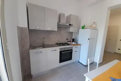 Image de Appartement situé au premier étage dans via Naxos à environ 20 mètres de la mer