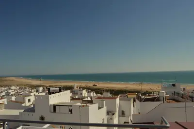 Image de Maison de ville moderne avec vue sur la mer, grande terrasse sur le toit avec douche ** Wlan ** Klima **