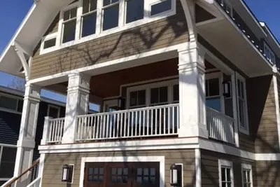Image de RÉDUCTION SPÉCIALE À La Maison De Macatwa Beach Front Face Au Lac Mich De Holland. Rive