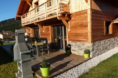 Image de Grand chalet neuf exposé plein sud tout confort, sauna, terrasse, wifi