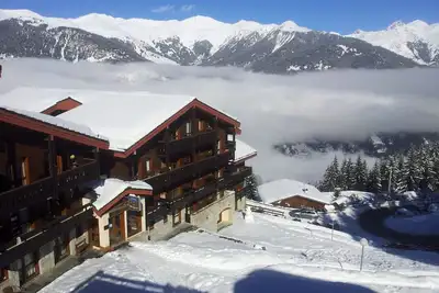 Image de Tarif En Baisse : Courchevel 1550 : été ou hiver un appartement pour 4 personnes