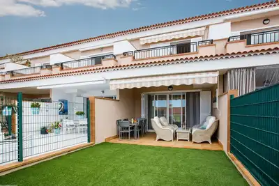 Image de Residencial Playa de La Arena Maison de ville avec vue sur l'océan