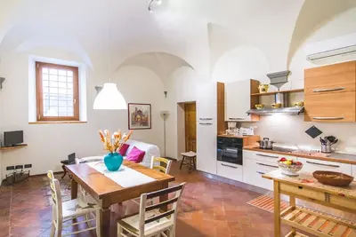 Image de Cozy appartement d'une chambre dans le quartier de Santa Croce avec garage privé
