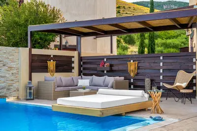 Image de Villa Rosa avec piscine partagée et vue imprenable sur la mer et la montagne du village