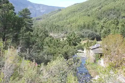 Image de Moulin réhabilité avec piscine naturelle et barbecue en milieu naturel