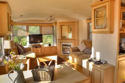 Image de Chalet Helyg Bach niché sur la pointe de la magnifique péninsule de Llyn