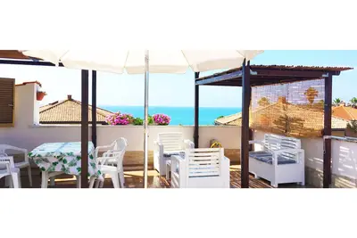 Image de appartement dans une villa en bord de mer avec une vue imprenable