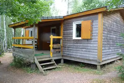 Image de chalet bois 6/8 personnes en pleine nature avec étang de pêche