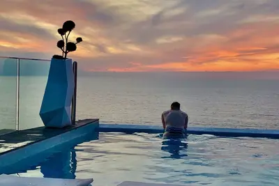 Image de Zone Romantica Condo de luxe, très bien situé,