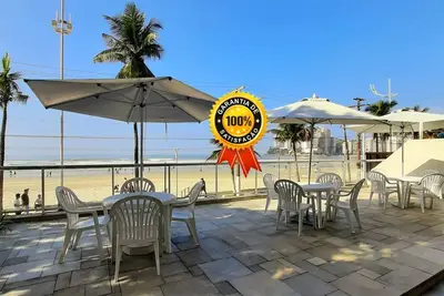 Image de Apt à Guarujá, en bord de mer, service de plage, wifi, climatisation, garage