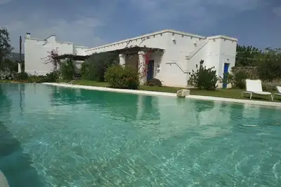 Image de Chambres de luxe avec piscine privée Masseria Auina, utilisation des espaces communs Savelletri Fasano