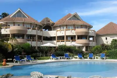 Image de Oasis. Très bel appartement avec vue sur l'océan à la plage