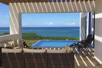 Image de Villa neuve 2 chambres + 1, 2 salles de bain plage privée, accès facile à la petite clé française