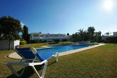 Image de Bel appartement au rez de chaussée avec jardin communautaire et piscine