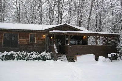 Image de Cabine en rondins 'Real Log Cabin' 1 chambre romantique et confortable avec bain à remous, cheminée + (4 personnes)